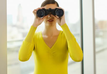 woman-looking-through-binoculars-pic-getty-images-336908728.jpg