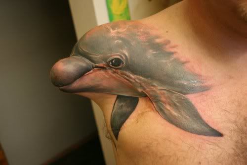 dolphin-arm-amputee-tattoo.jpg