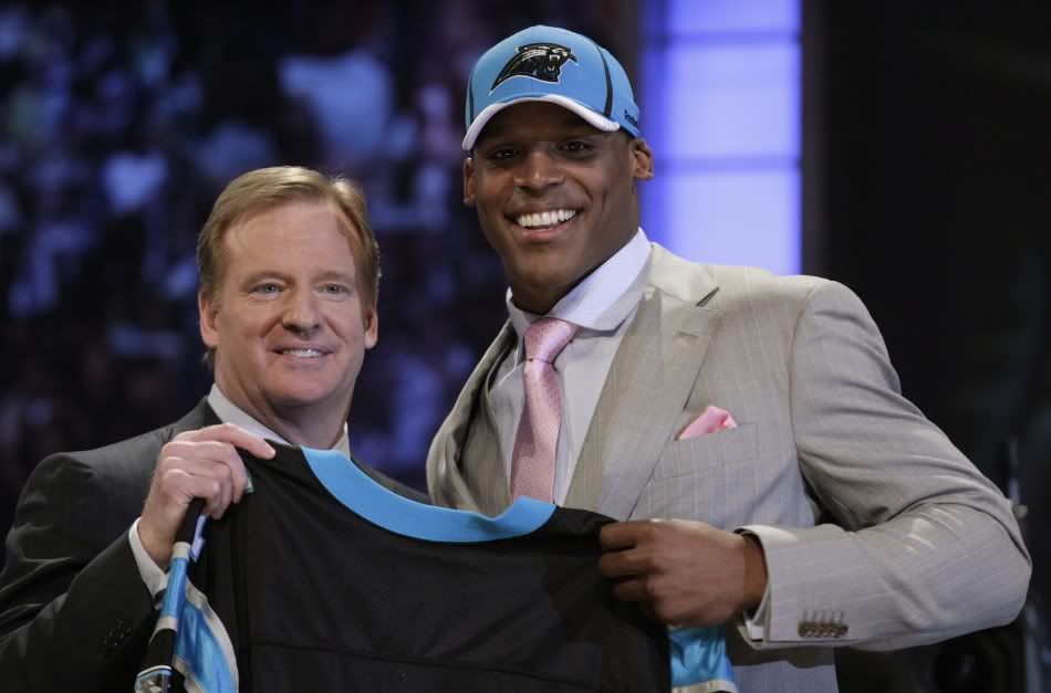 92952-quarterback-cam-newton-of-auburn-university-poses-with-nfl-commissione.jpg
