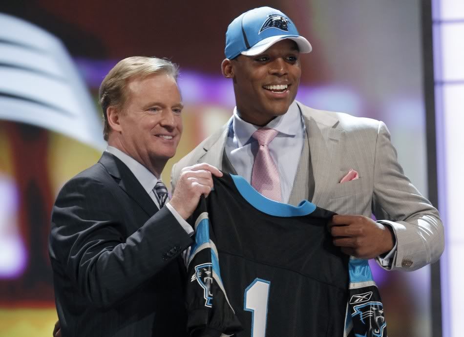92965-quarterback-cam-newton-of-auburn-university-stands-with-nfl-commission.jpg